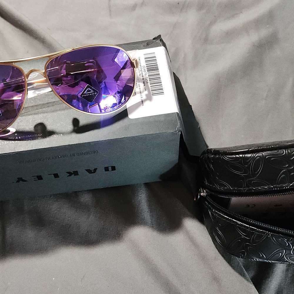 Oakley Gold Frame Sunglasses with Purple Lenses